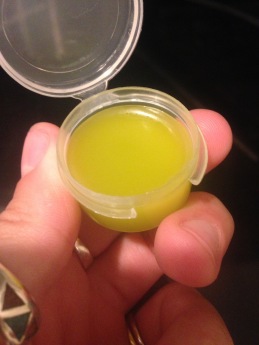 The green-tinted salve (the color is from the plantain)